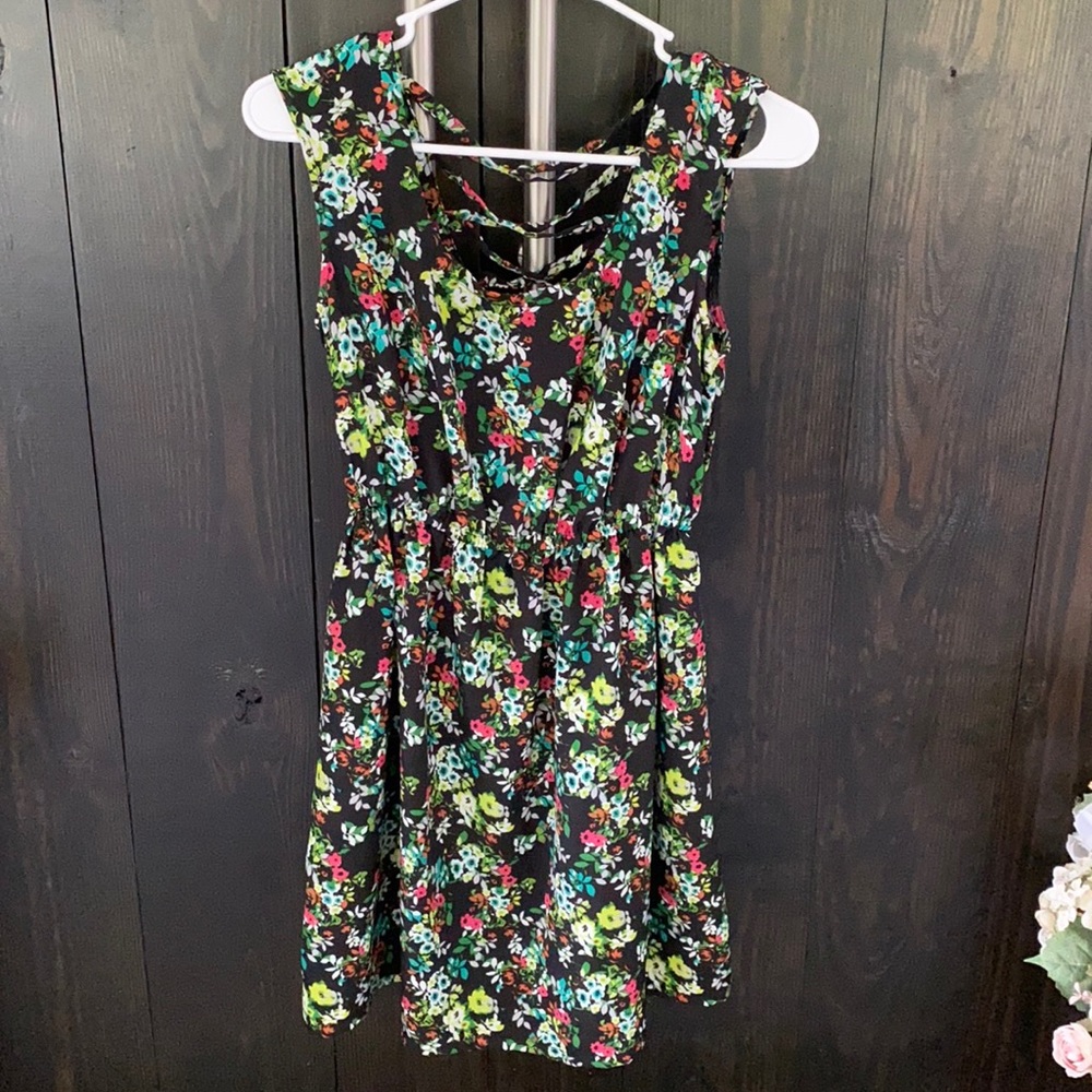 Size Medium Patterned Dress.  Comes slightly above knee.
